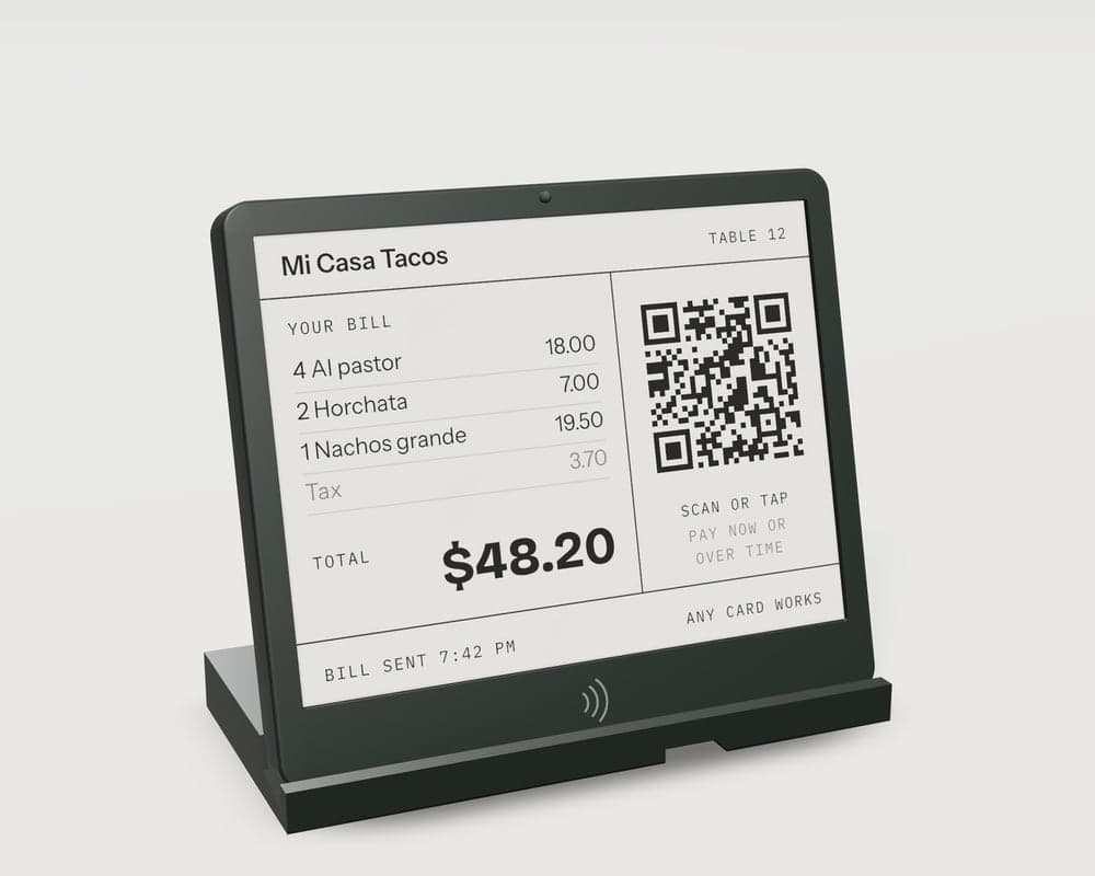 A Clear Point on a table, showing the bill